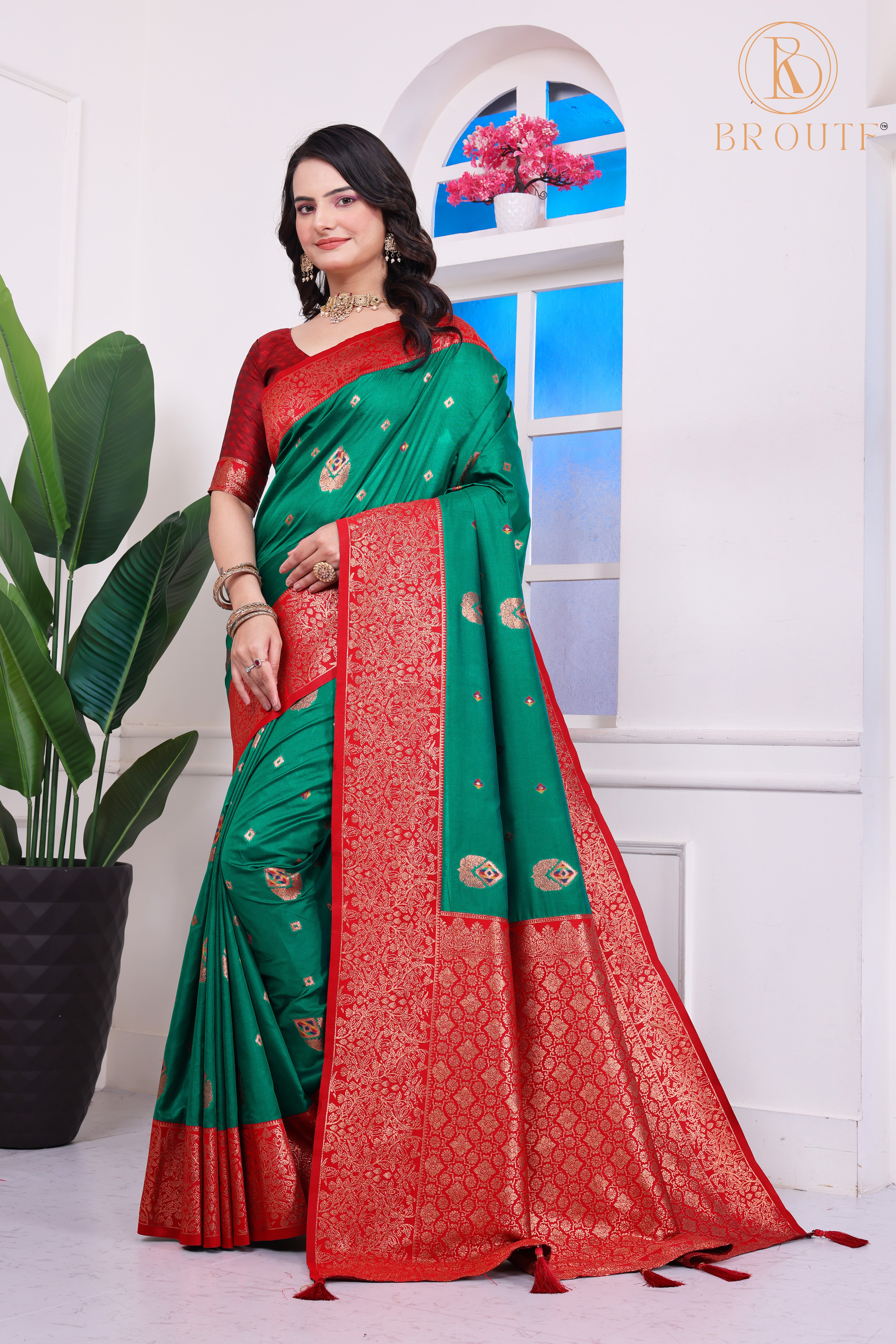 Regal Green Banarasi Silk Saree with Zari Weaving & Red Border