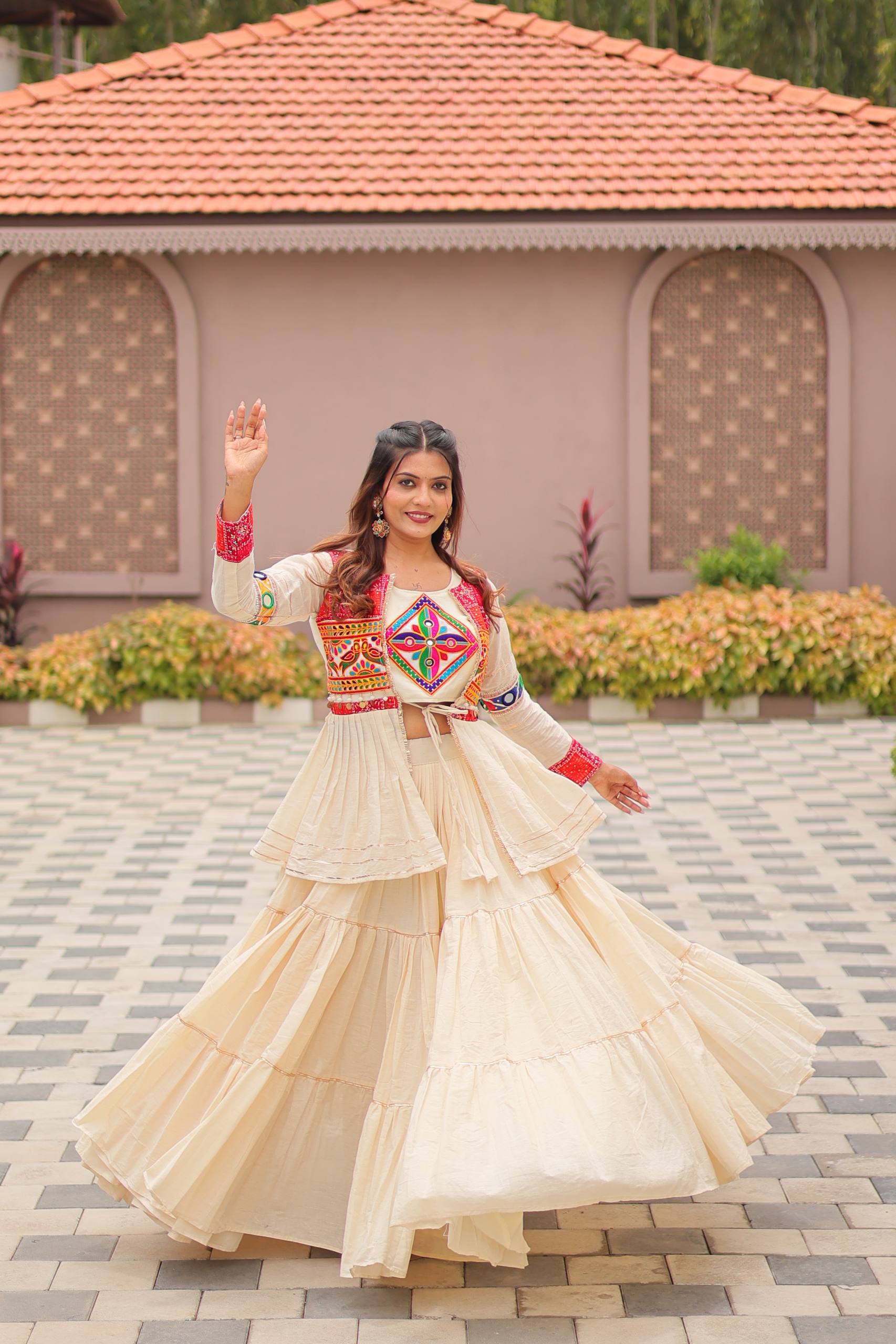 Elegant Off-White Ruffle Lehenga Choli with Vibrant Embroidered Koti Jacket