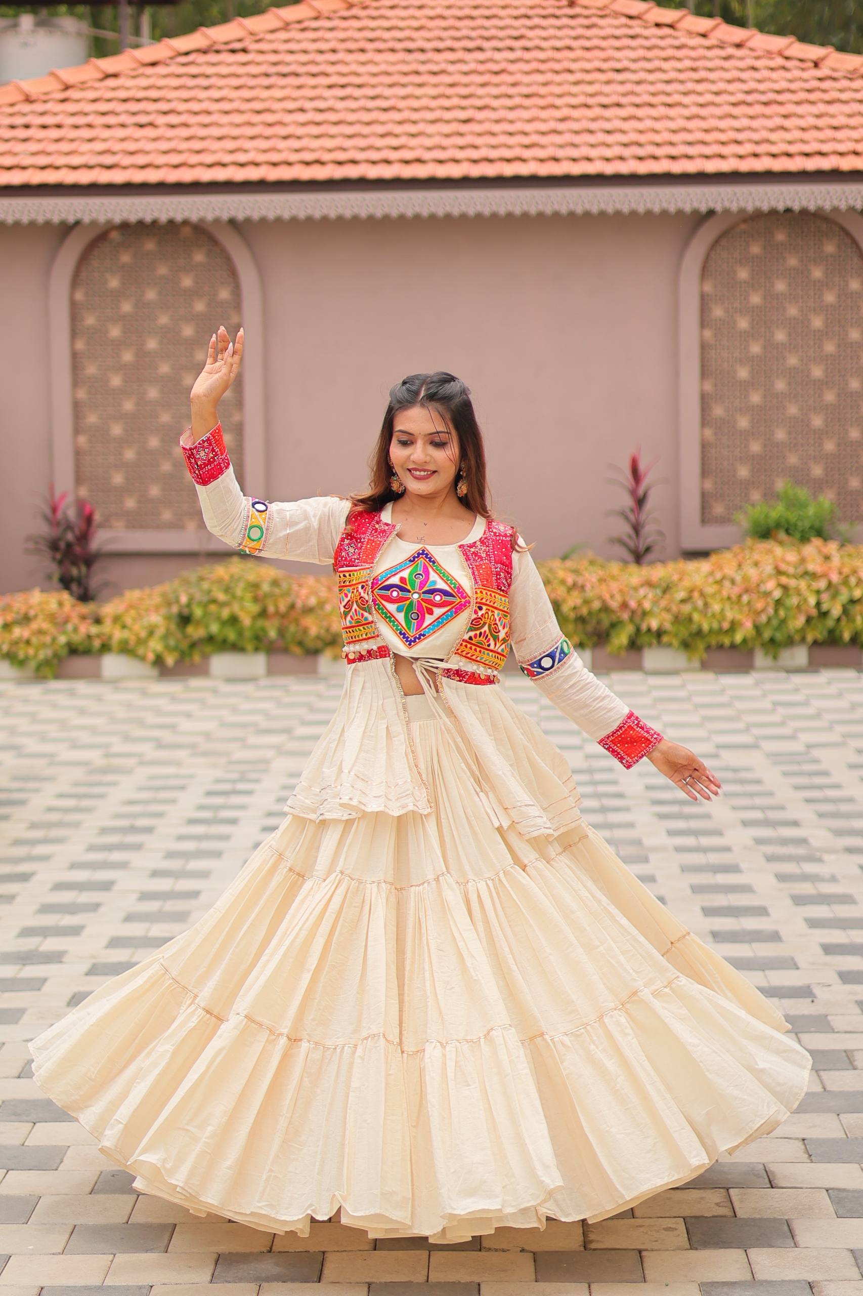 Elegant Off-White Ruffle Lehenga Choli with Vibrant Embroidered Koti Jacket