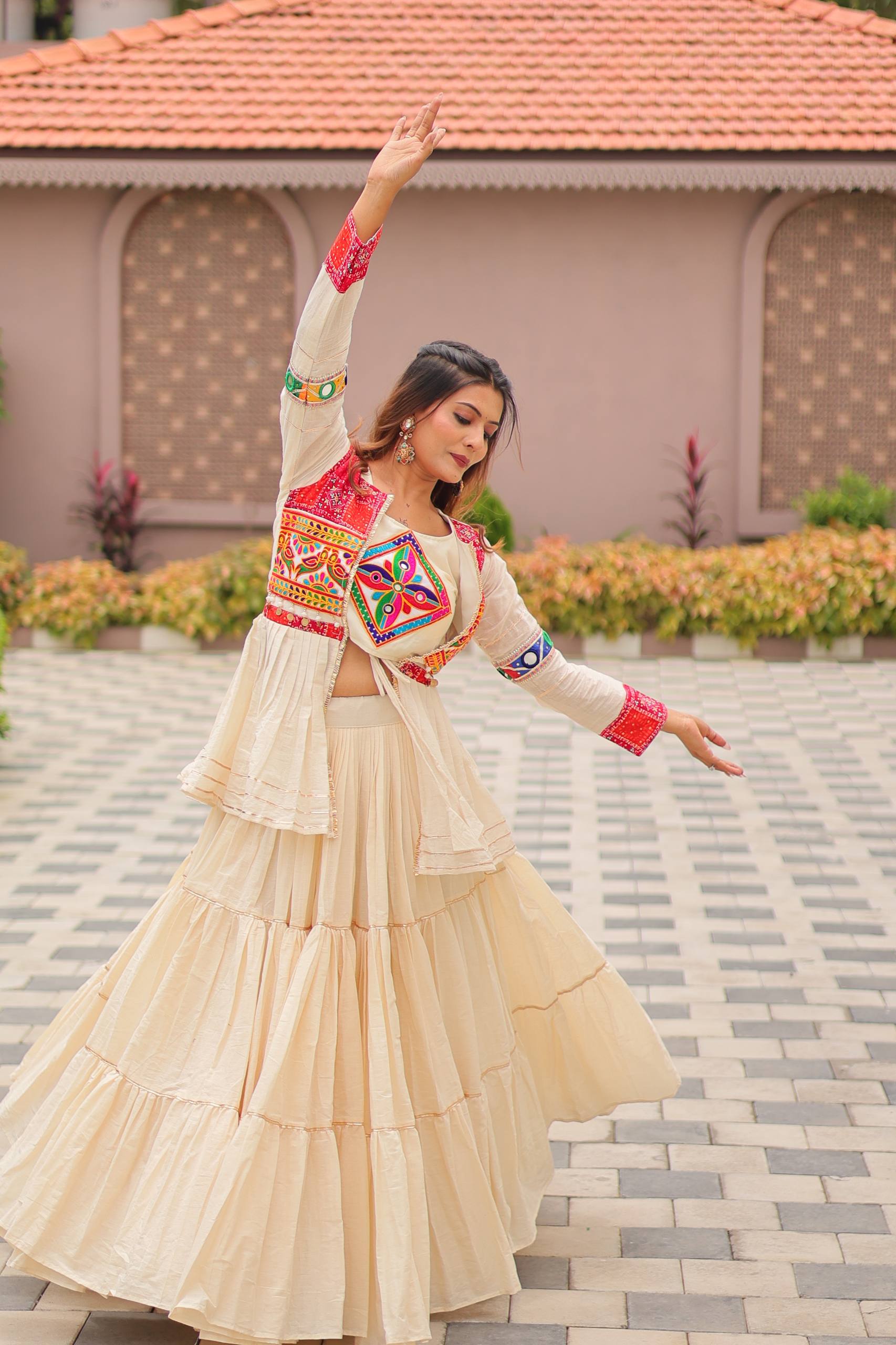 Elegant Off-White Ruffle Lehenga Choli with Vibrant Embroidered Koti Jacket