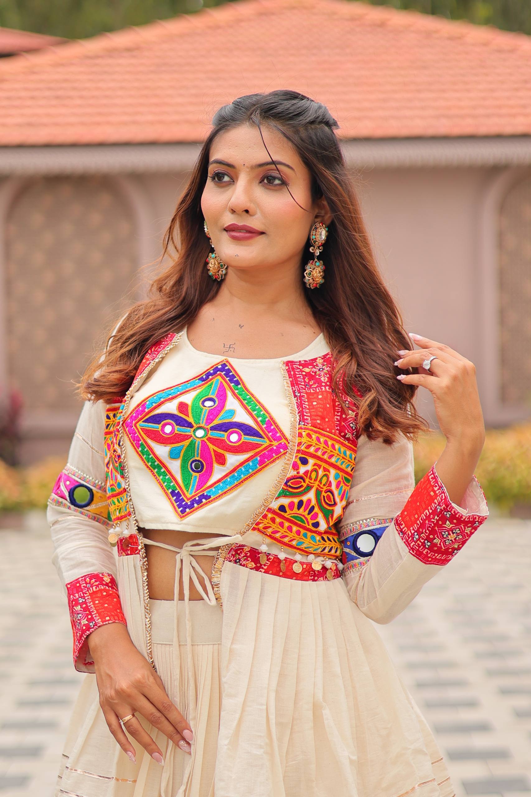 Elegant Off-White Ruffle Lehenga Choli with Vibrant Embroidered Koti Jacket