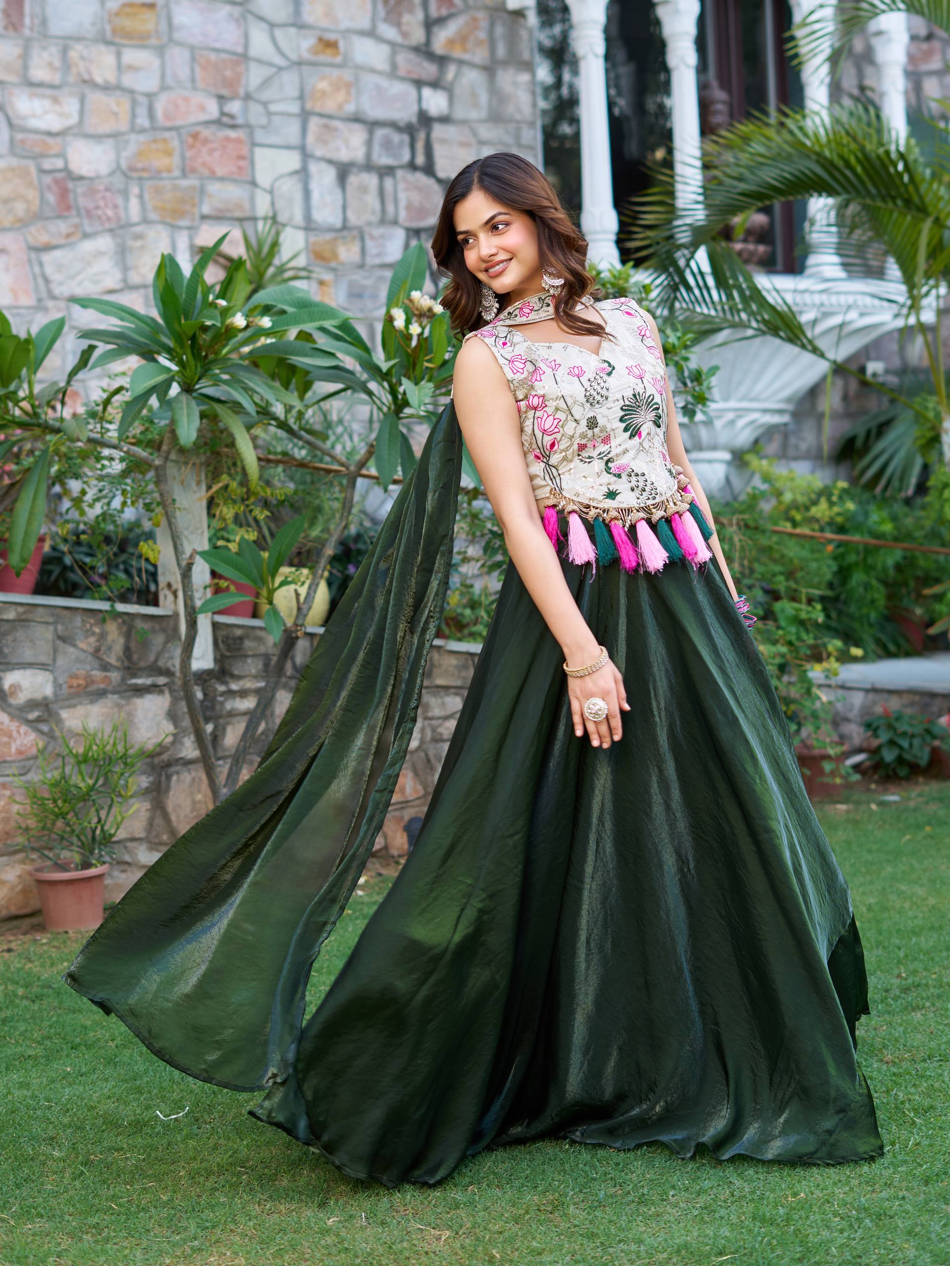 Elegant Silk Lehenga Choli with Embroidered Blouse and Tassel Detail