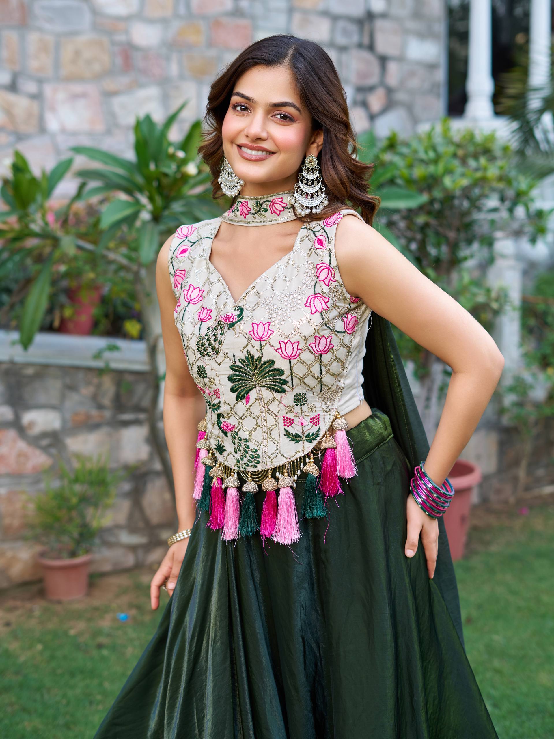 Elegant Silk Lehenga Choli with Embroidered Blouse and Tassel Detail