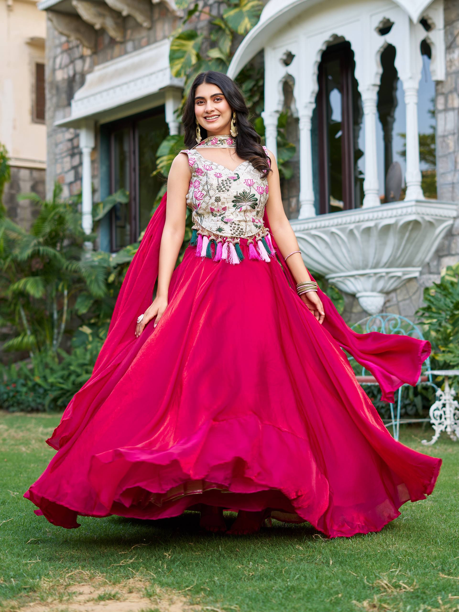 Elegant Silk Lehenga Choli with Embroidered Blouse and Tassel Detail