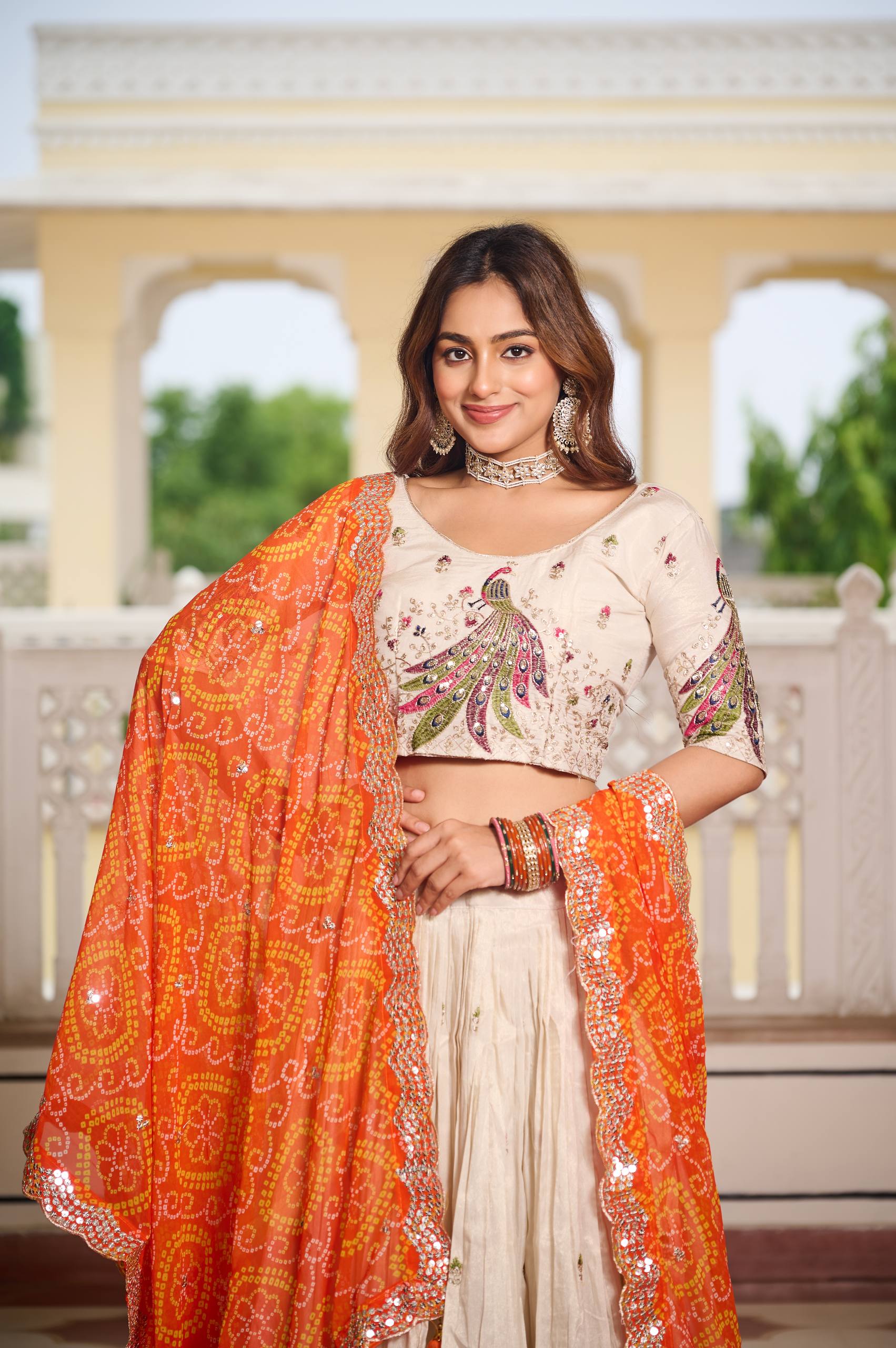 Designer Off-White Lehenga Choli with Heavy Thread Work and Contrast Bandhani Dupatta