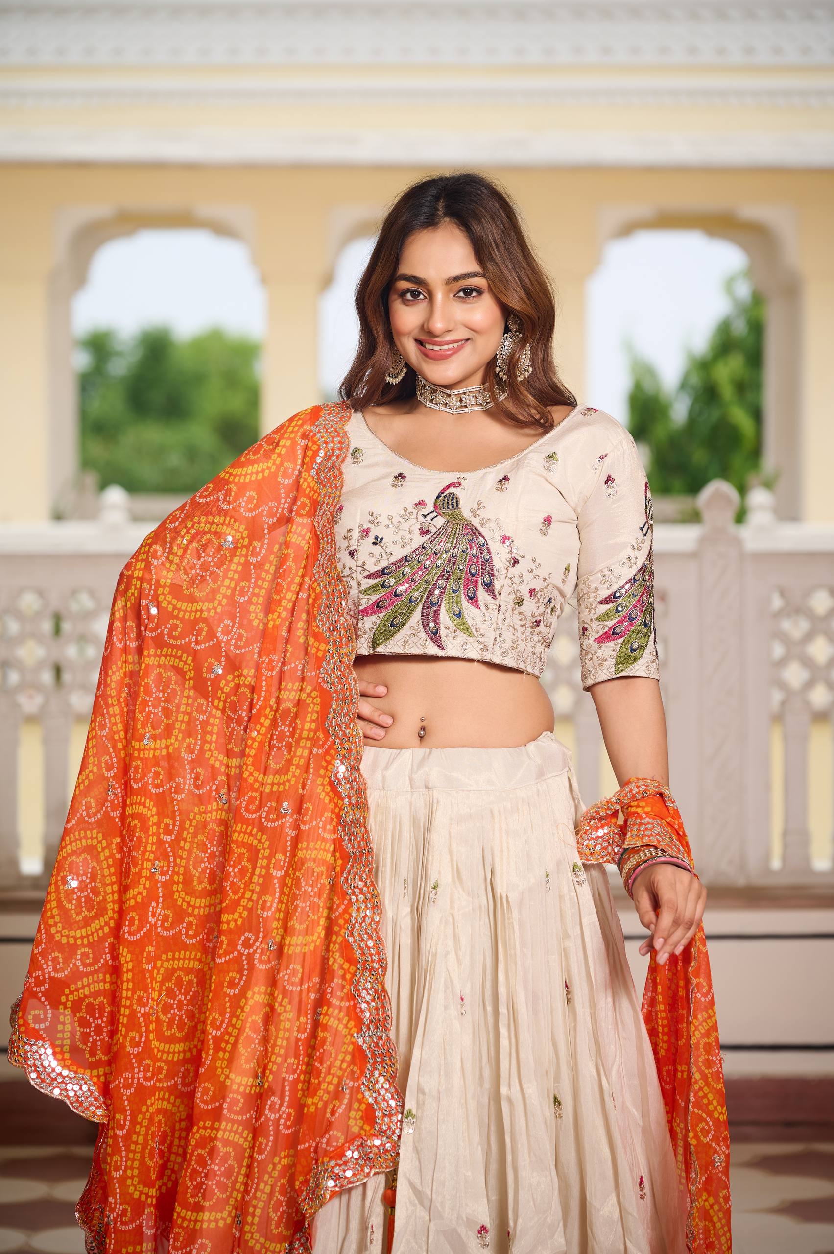 Designer Off-White Lehenga Choli with Heavy Thread Work and Contrast Bandhani Dupatta