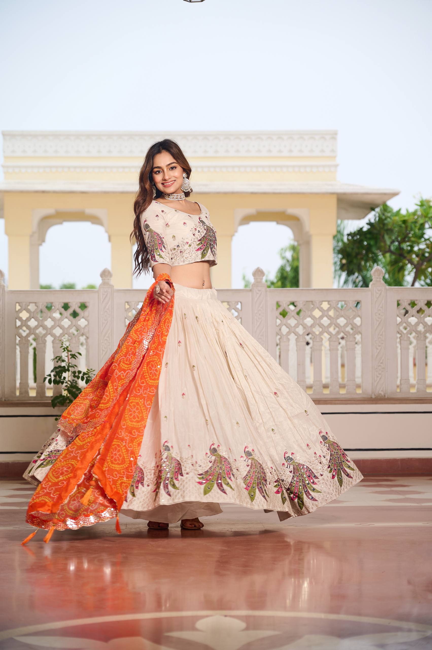 Designer Off-White Lehenga Choli with Heavy Thread Work and Contrast Bandhani Dupatta