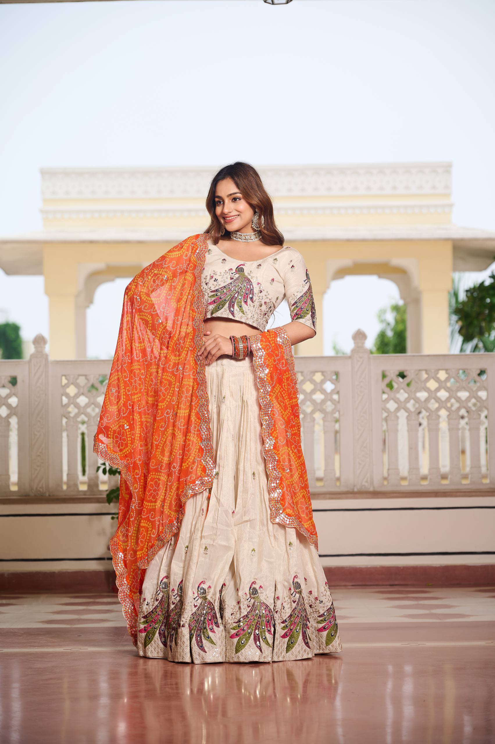 Designer Off-White Lehenga Choli with Heavy Thread Work and Contrast Bandhani Dupatta