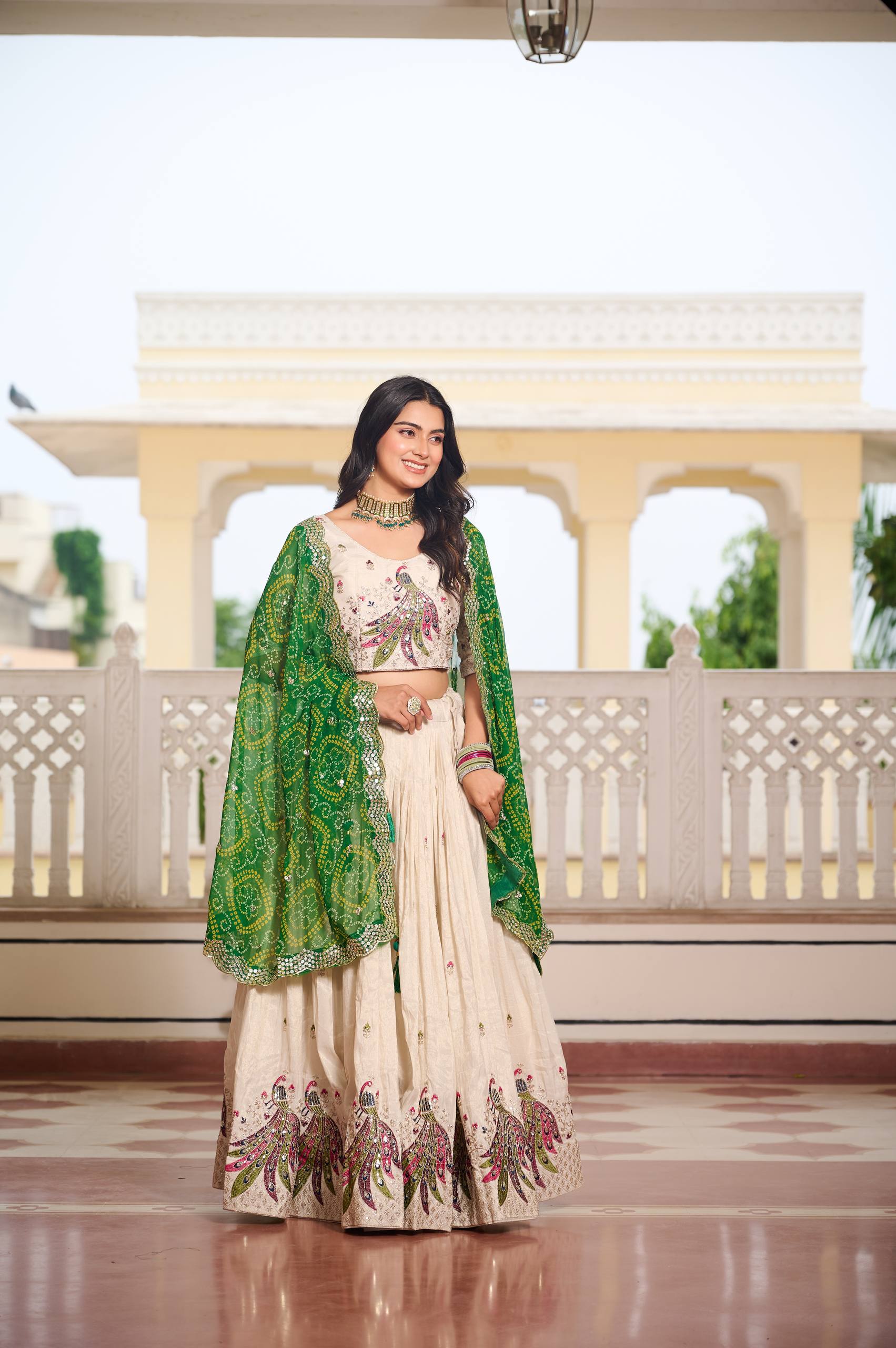 Designer Off-White Lehenga Choli with Heavy Thread Work and Contrast Bandhani Dupatta