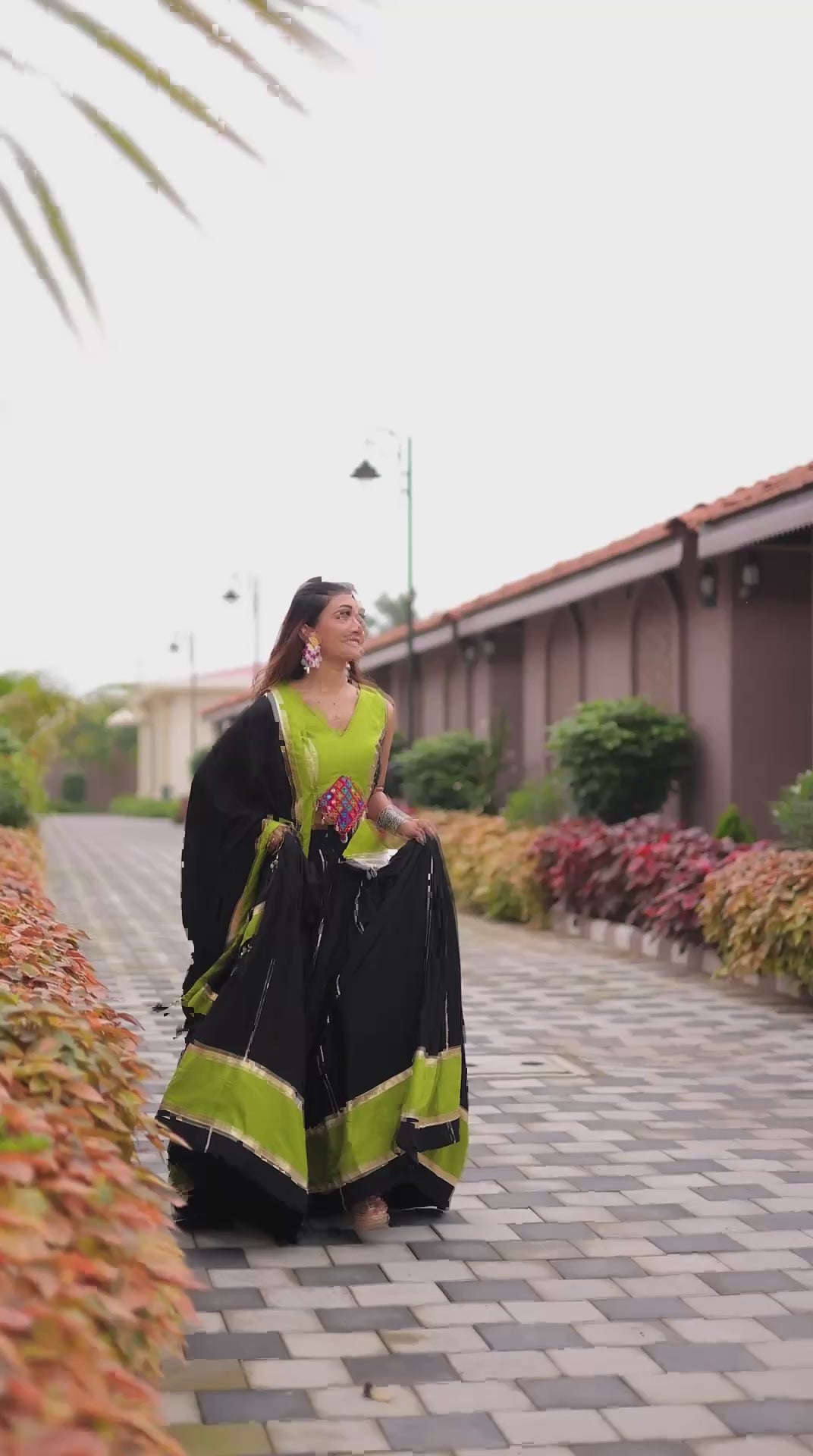 Navratri Special Black Cotton Gamthi Work Lehenga Choli with Green Accents