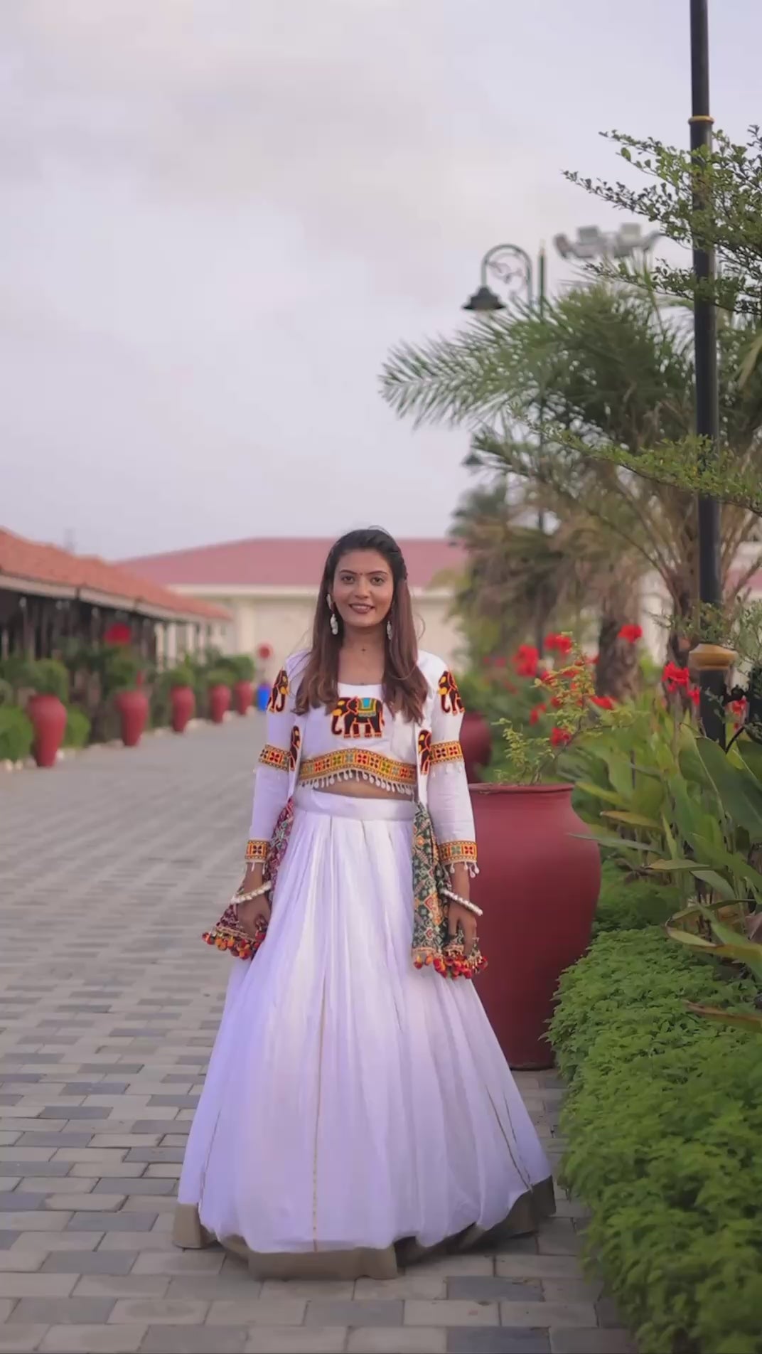 Traditional White Lehenga Choli with Embroidered Jacket