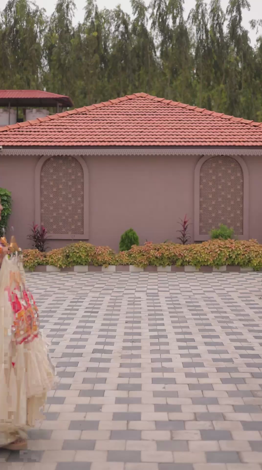 Elegant Off-White Ruffle Lehenga Choli with Vibrant Embroidered Koti Jacket