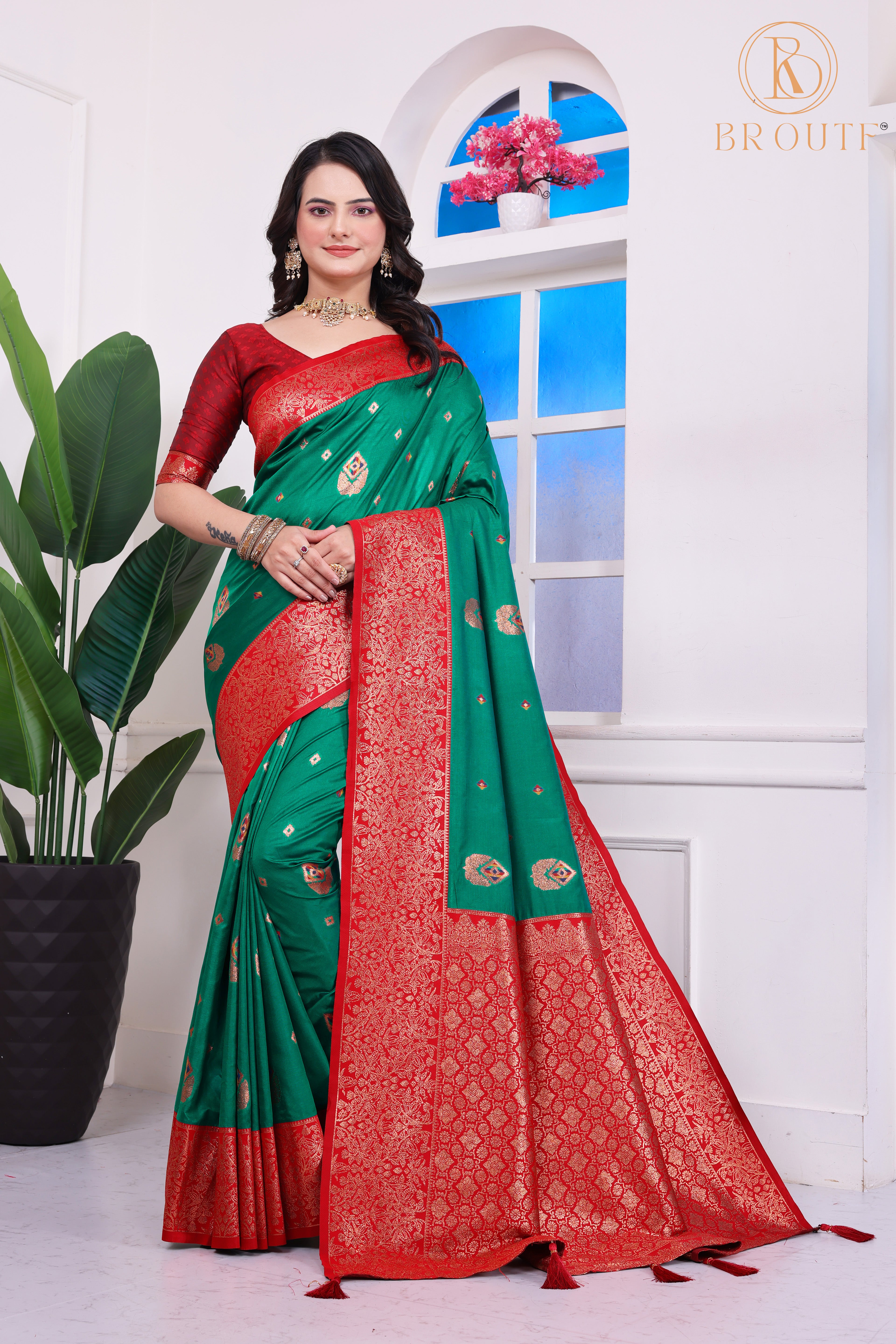 Regal Green Banarasi Silk Saree with Zari Weaving & Red Border