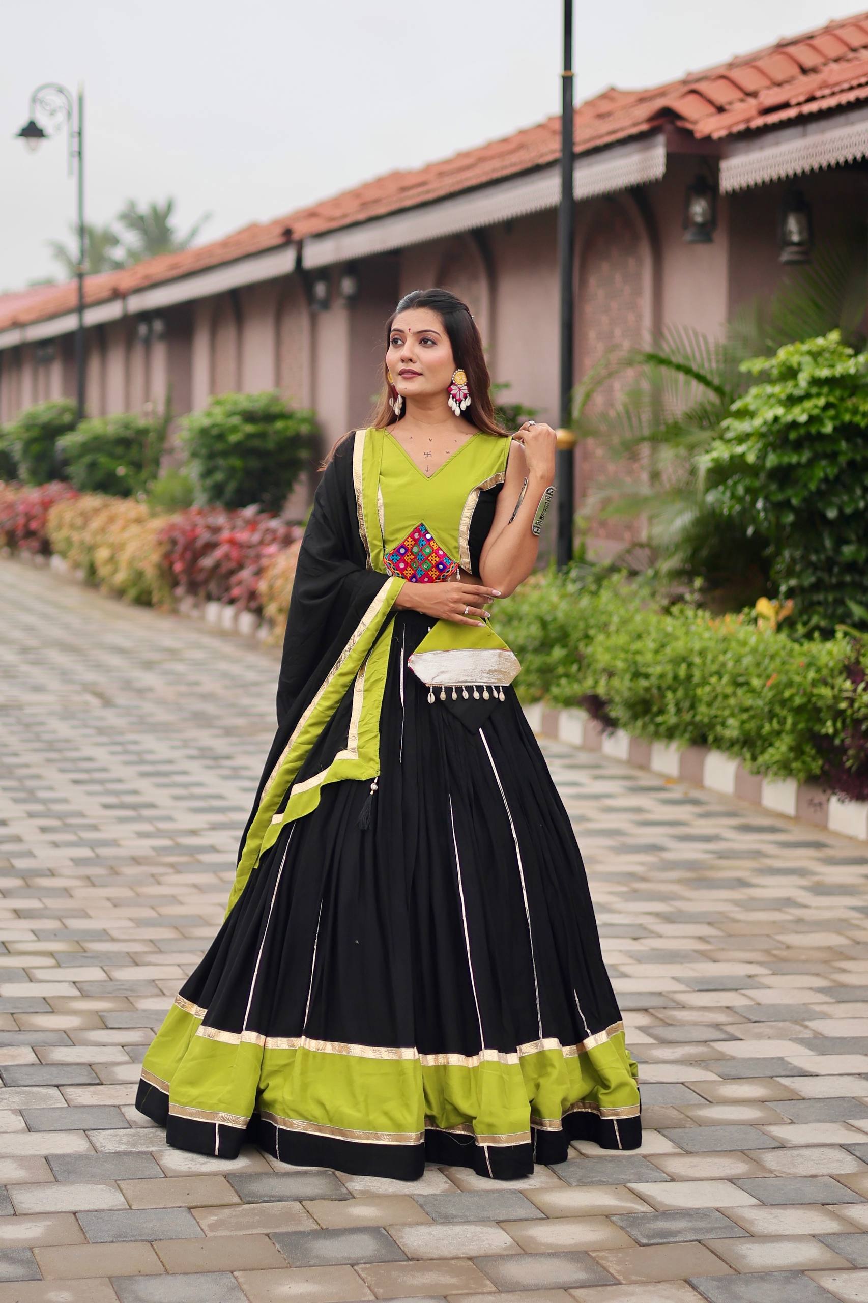 Navratri Special Black Cotton Gamthi Work Lehenga Choli with Green Accents