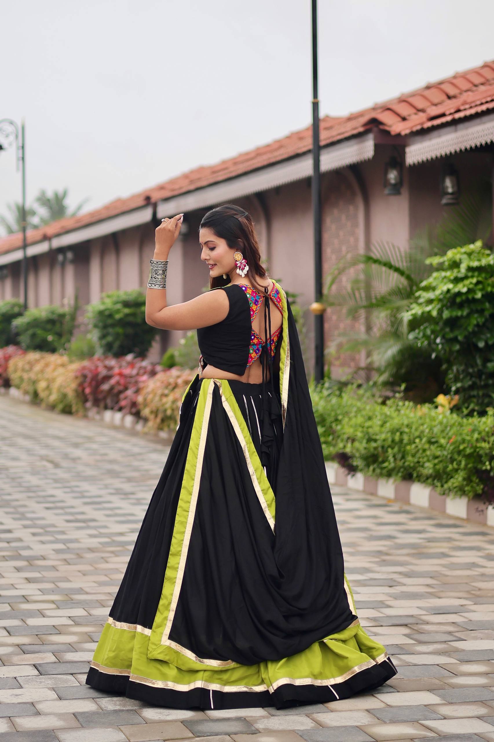 Navratri Special Black Cotton Gamthi Work Lehenga Choli with Green Accents