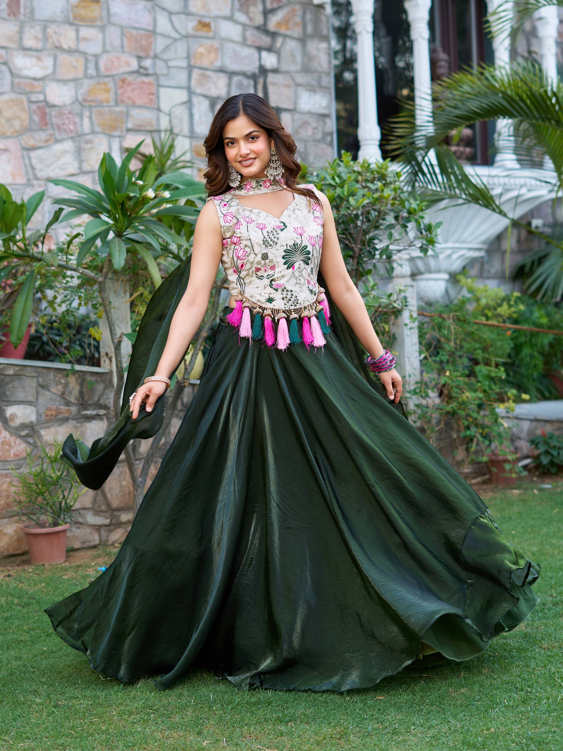 Elegant Silk Lehenga Choli with Embroidered Blouse and Tassel Detail