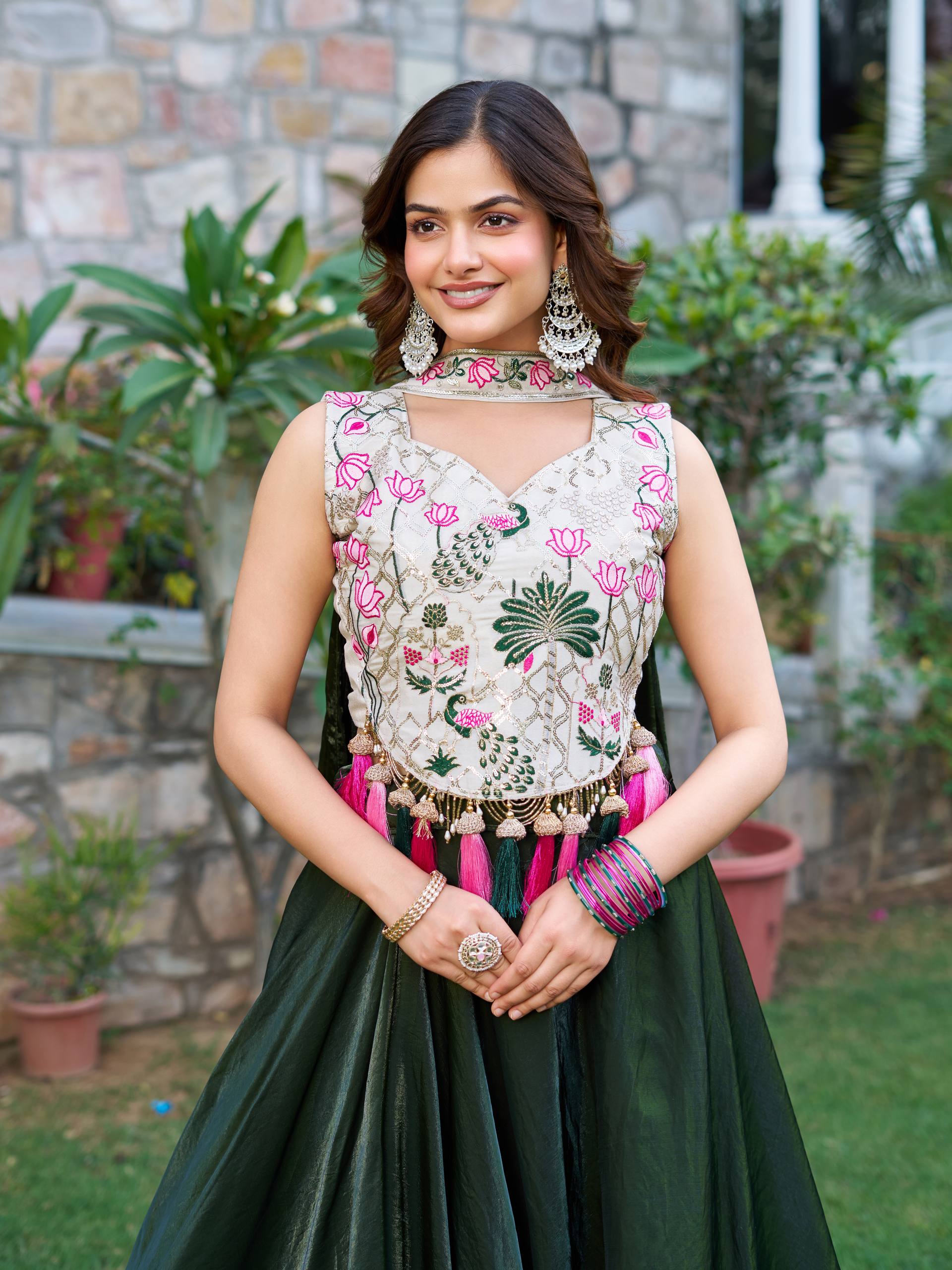 Elegant Silk Lehenga Choli with Embroidered Blouse and Tassel Detail