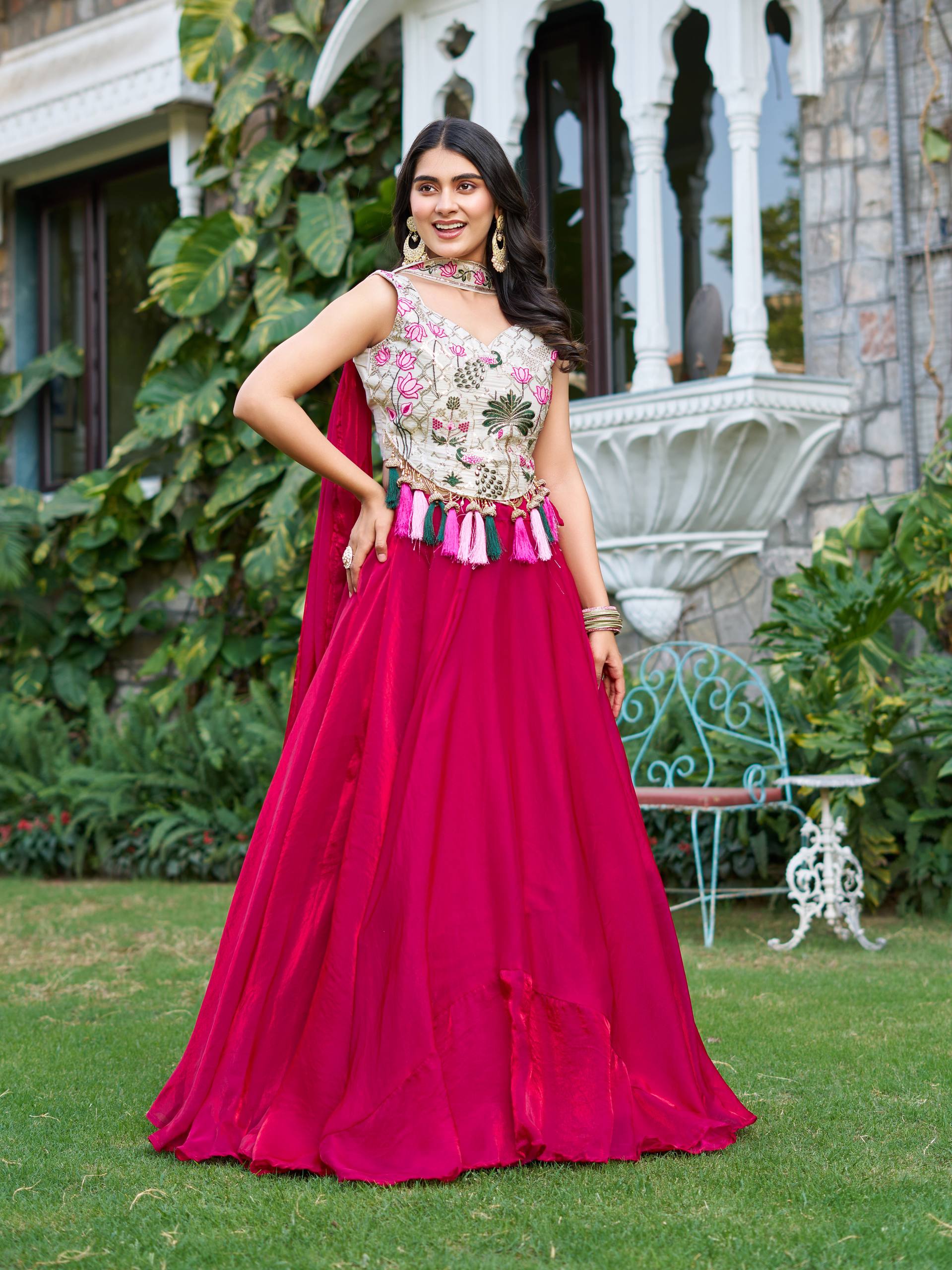 Elegant Silk Lehenga Choli with Embroidered Blouse and Tassel Detail