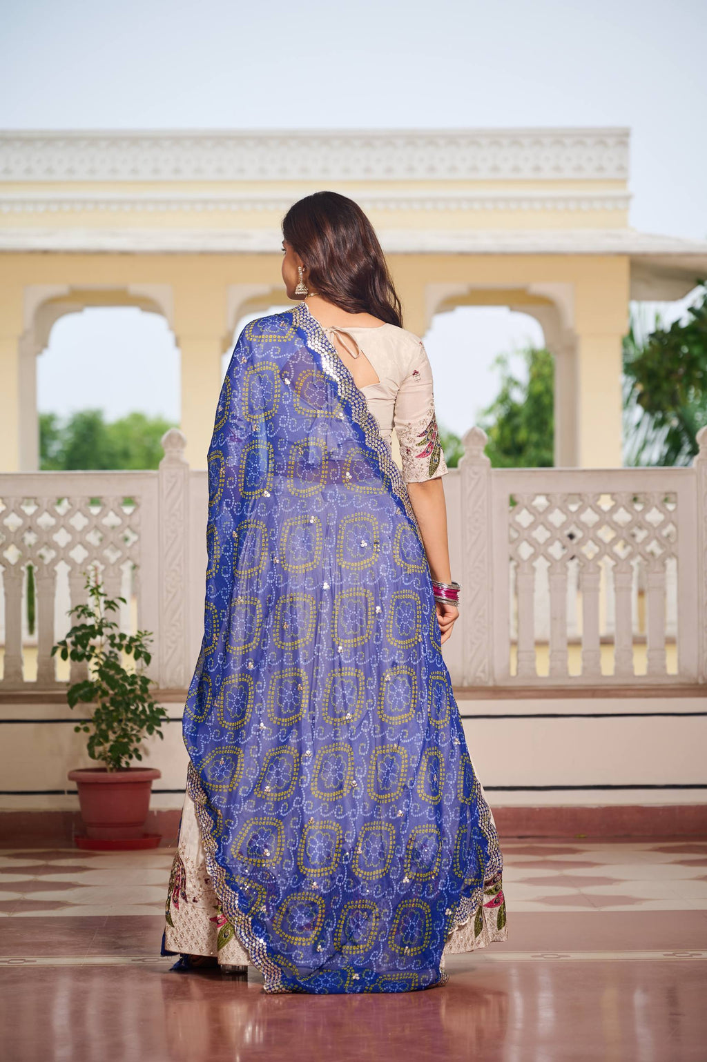 Designer Off-White Lehenga Choli with Heavy Thread Work and Contrast Bandhani Dupatta
